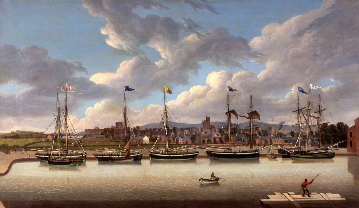 Carlisle Canal Basin — a painting showing six sailing vessels moored at the basin, with Carlisle's cathedral and city skyline behind them